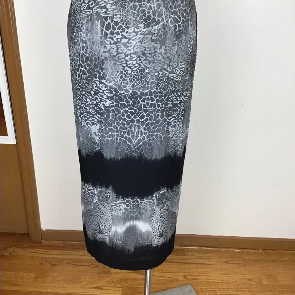 Gianni gray 2 pc skirt and top set size 12.